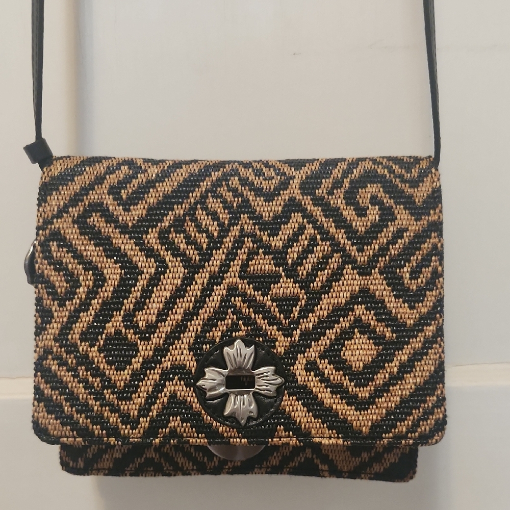 Patricia Nash Black and Tan Woven Crossbody with Floral Clasp